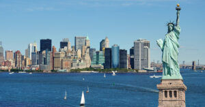 The Statue of Liberty with the New York City skyline in the background