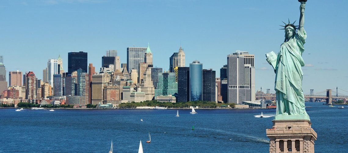 The Statue of Liberty with the New York City skyline in the background